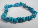 Howlit modrý náramek tromlovaný