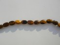 Tygří oko ovál facetovaný 8x10 mm šňůra