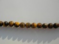Tygří oko kuličky facetované 10 mm šňůra